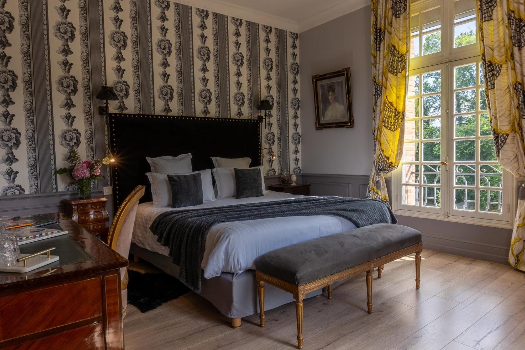 Castel Bois Marie, Maison D'Hotes มงโตบ็อง ภายนอก รูปภาพ A bedroom at the hotel